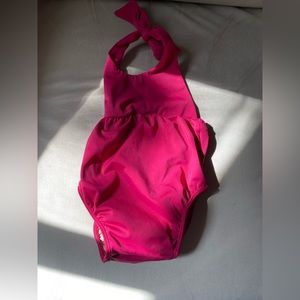 Magenta baby swimmer